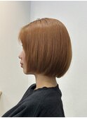 オレンジのムヌーディカラーに小顔ボブ