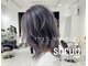 シュラッグ(shrug)の写真