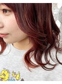 オレンジカラーミディアムに合わせたカット＆巻き髪