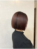 パツっとボブ×オレンジカラー