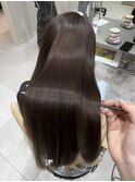 縮毛矯正で自然な艶髪ストレートに