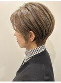 ショートボブくびれヘアアプリコットオレンジタッセルボブ
