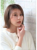 ショコラベージュの小顔ベビーバングボブウルフカール