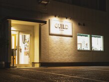 ギルド(GUILD)の雰囲気（白が基調の清潔感のあるお店♪看板あり　正面広い駐車場あり）