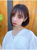 風になびく軽やかなタンバルモリ/タッセルボブ/内巻きボブ