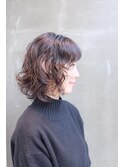 無造作に揺らぐウエイブスタイル