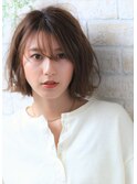 ショコラベージュの小顔ベビーバングボブウルフカール