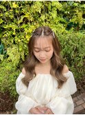まろみベージュの巻き髪