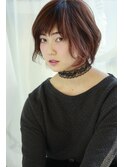 暖色系カラーとデザインされたボブスタイル