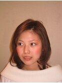 少し大人な女性らしさの中に、かわいらしさを残したスタイル
