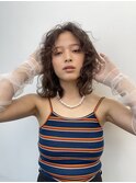 ミディアムヘアーにウェーブパーマ