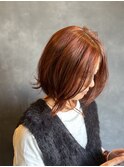 深みオレンジの抜け感切りっぱなしボブ