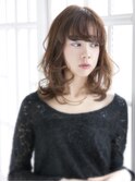 ツヤウェット仕上げのふわふわミディ