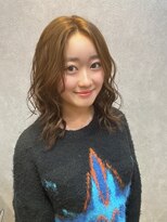 海の似合うツイスト巻きくびれヘア