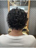 カールが強めなくるくるパーマ