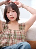 ショートボブペールベージュのふんわりエアリーパーマ