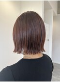 オレンジカラーの切りっぱなしボブ