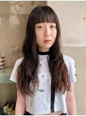 ロングヘアとウェーブパーマ