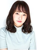 揺れるナチュラルパーマスタイル