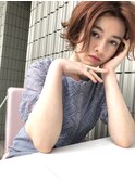 大人の雰囲気が増すセンター分けショートヘアー