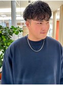 前下がりパーマスタイル