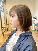 さりげない外ハネがポイントのボブ
