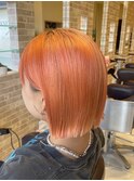 オレンジ×ぱっつんボブ