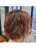 オレンジ色パーマスタイル