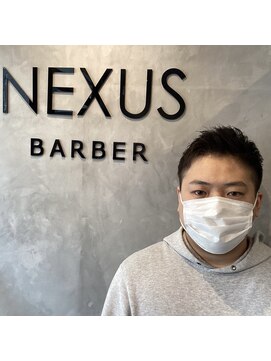 ネクサス 西宮北口 自然な束感のアップバングショート