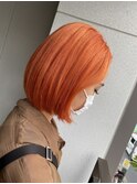 オレンジカラーのミニボブ