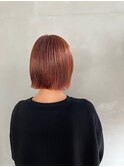 透け感レッド×オレンジ。抜け感ミニボブでこなれ感◎