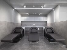 レウーナ 塚口(Reuna)の雰囲気（曲線ライトに包まれ、深い癒しへ導く上質シャンプー空間）