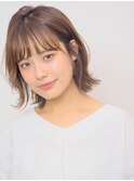 柔らかオレンジベージュの肩上ハネボブ