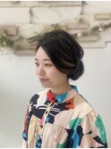レトロなアップヘア