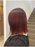ぷつっとボブとほんのり赤いオレンジカラー
