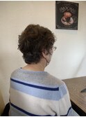 パーマをかけおセットなシニアの落ち着いのあるヘアスタイル