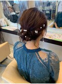 パールピンで華やかさをプラス◎上品シニヨン/結婚式/二次会