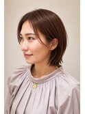 女性らしいミディアムボブスタイル