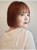 コーラルオレンジ 顔周りレイヤー ラウンドバング 切りっぱなし