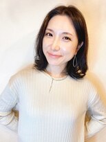 柔らかくて暖かいミディアムパーマスタイル