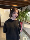 丸みのあるボブとベージュ