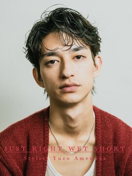 オーシャントーキョーオーバー 渋谷(OCEAN TOKYO OVER) リバーススパイラルパーマウルフセンターパート黒髪社会人