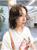 黒髪ミディアムボブスパイラルパーマヘア