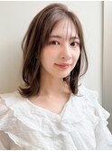艶感デジタルパーマ斜めバングミルクティーブロンド愛され