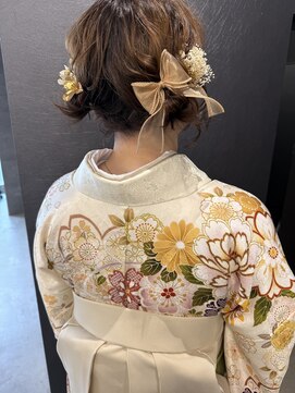 スノウ(SKNOW) ヘアアレンジ　ツイン　シニヨン