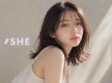 シー 岡崎(,SHE)