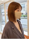 切りっぱなしタッセルボブベージュカラーワイドバング外ハネ