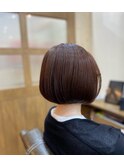 オレンジブラウンのボブスタイル