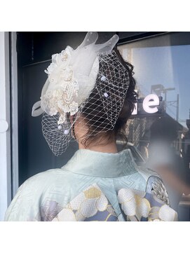 ミル(1001 mille) 成人式・卒業式に！お花が可愛いまとめ髪【1001mille】