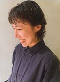 パーマを生かしたショートウルフ